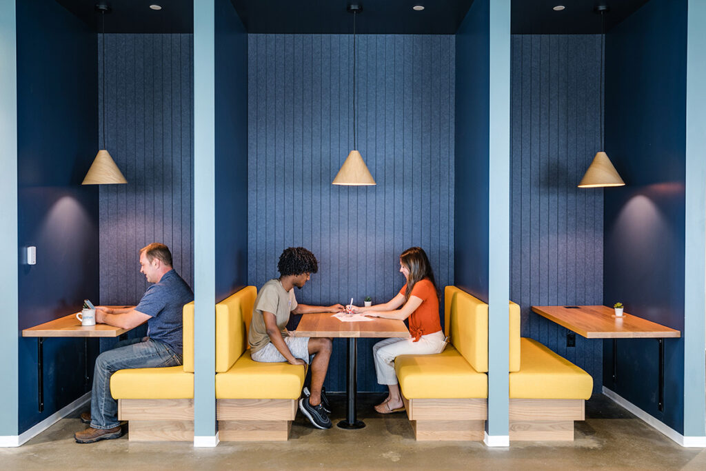 People collaborating in booths, Virginia Beach, VA
