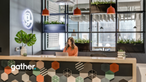 Woman working at the front desk of Gather Norfolk